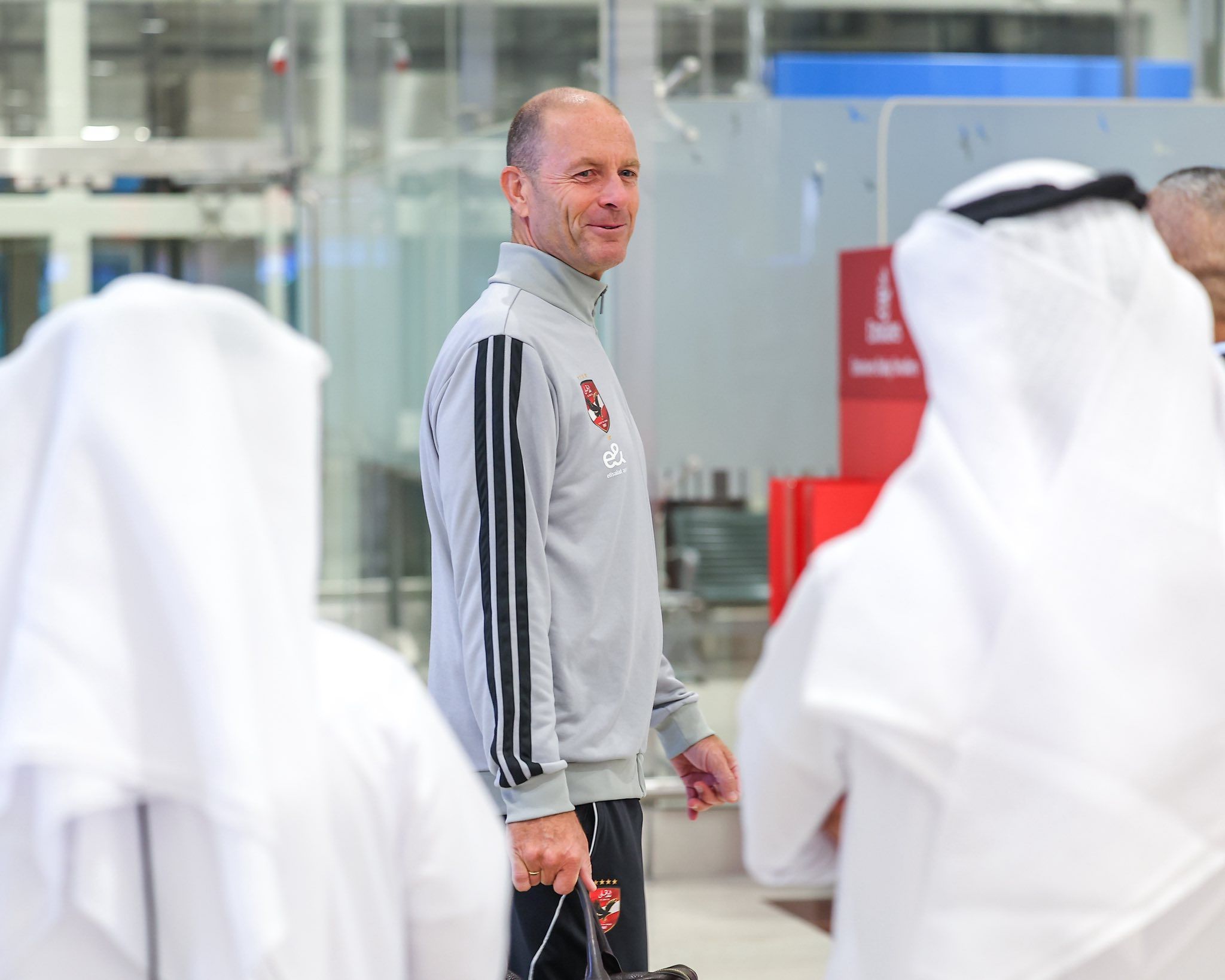 May be an image of one or more people and text