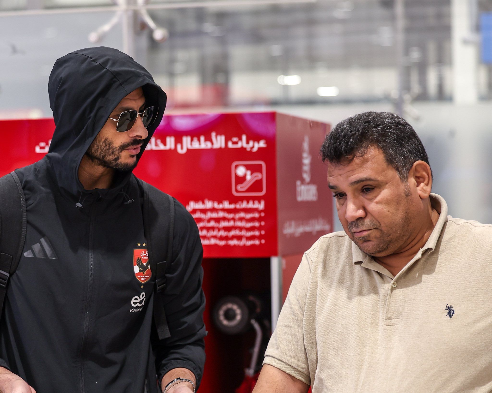 May be an image of one or more people and text