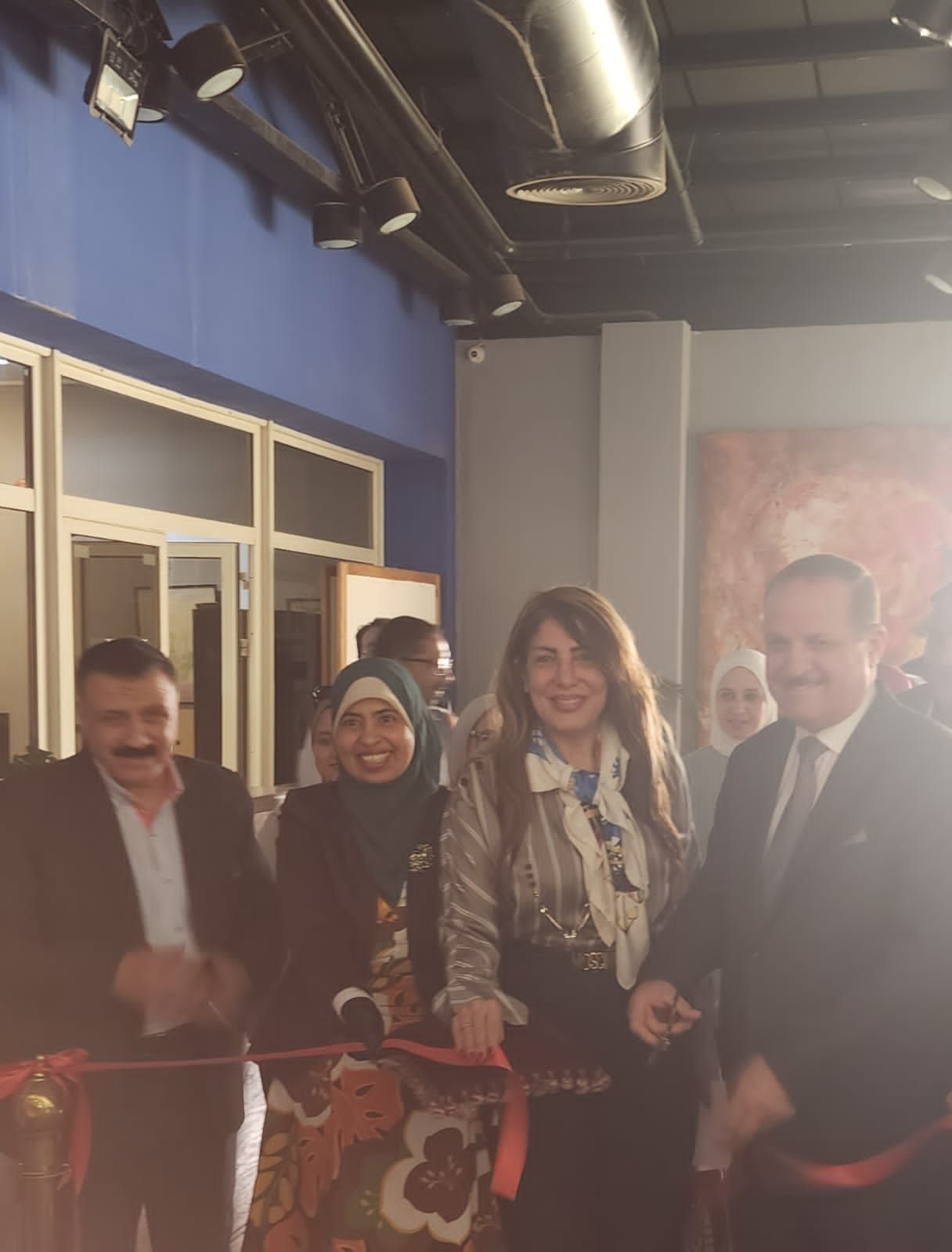 أثناء افتتاح معرض مسابقة عدسة فنان