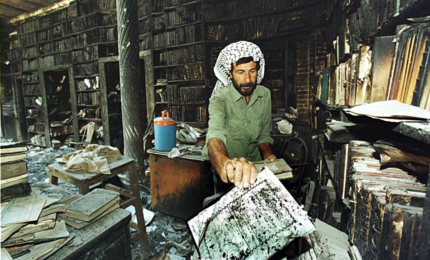 حريق المكتبة الوطنية العراقية – بغداد 2003 حريق المكتبة الوطنية العراقية – بغداد 2003