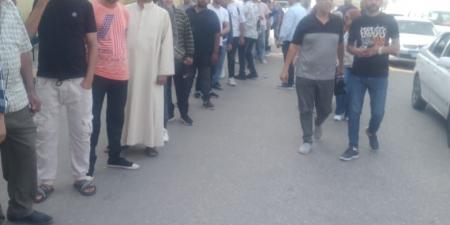 حضور مبكر من المواطنين أمام اللجان الانتخابية في إمبابة (صور)