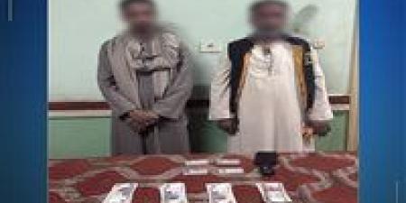 ضبط شخصين بحوزتهما بطاقات وأموال لدفع الناخبين بقنا
