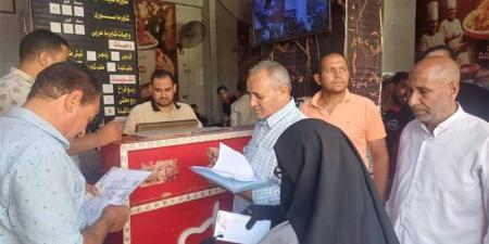 28 محضرًا في حملات بملوي لضبط الأسواق وإزالة الإشغالات