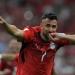 تريزيجيه يرد على أنباء اعتزاله دوليًا ويكشف نصيحته لـ محمد صلاح