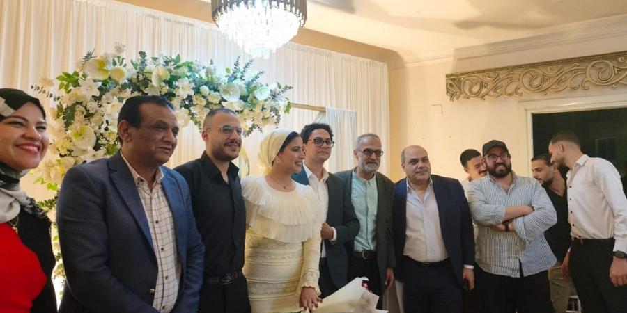 «الدستور» تهنئ الزميلين أحمد غنام وسارة الشلقاني بخطوبتهما