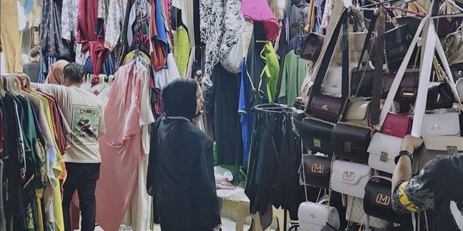 "انتعاشة وموسم خير".. بالتخفيضات أصحاب محلات الملابس يستعدون لعيد الأضحى