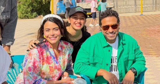 أحمد فهمي وأسماء جلال فى صور جديدة من كواليس فيلم الفيل على الدرفيل